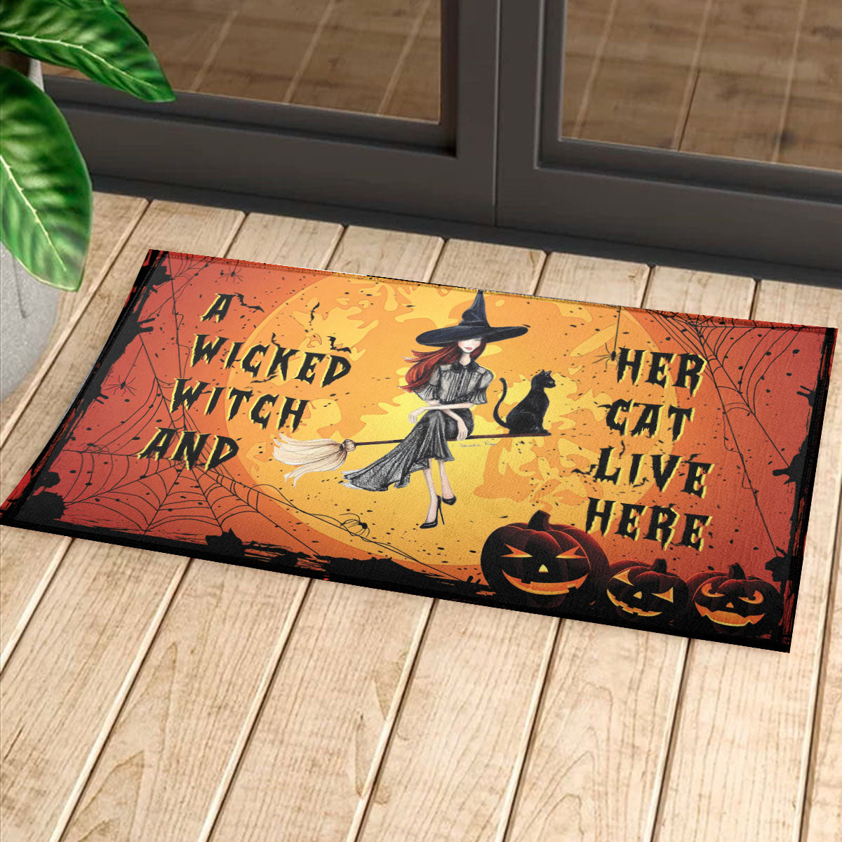 A Wicked Witch And Her Cat Live Here - Witch Doormat 0822